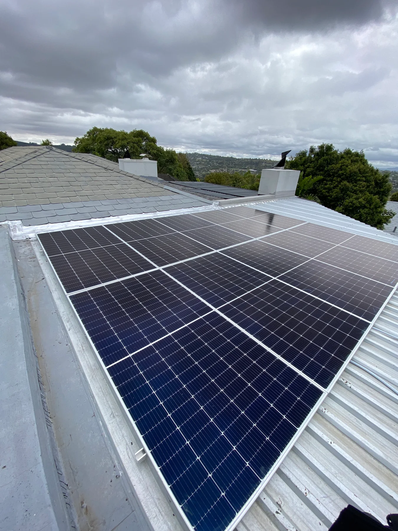Solar panel array on a metal roof