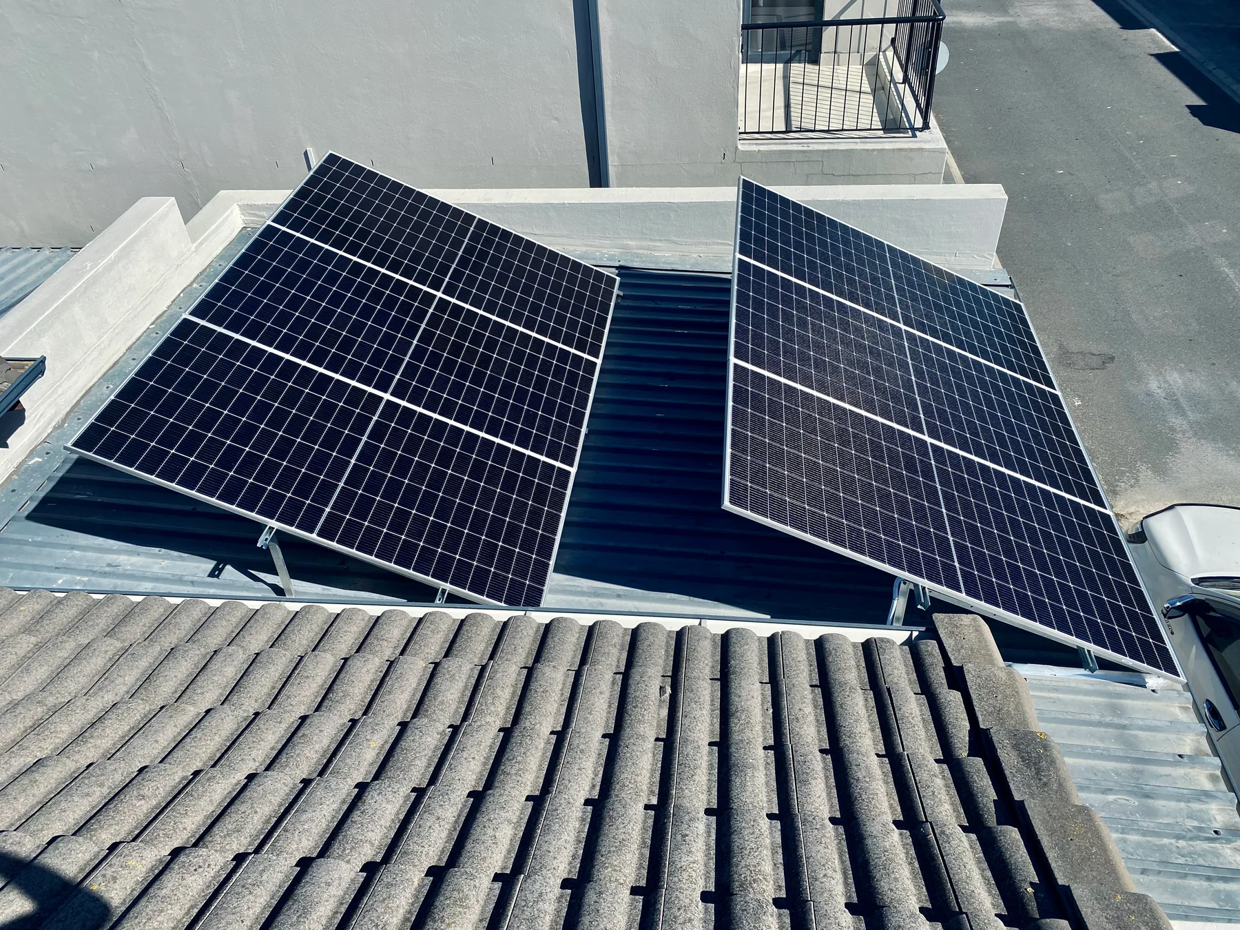 Solar panels installed across a tiled roof