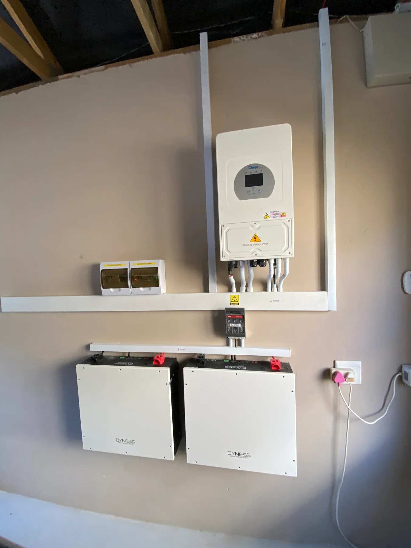 Wall-mounted inverter and battery installation